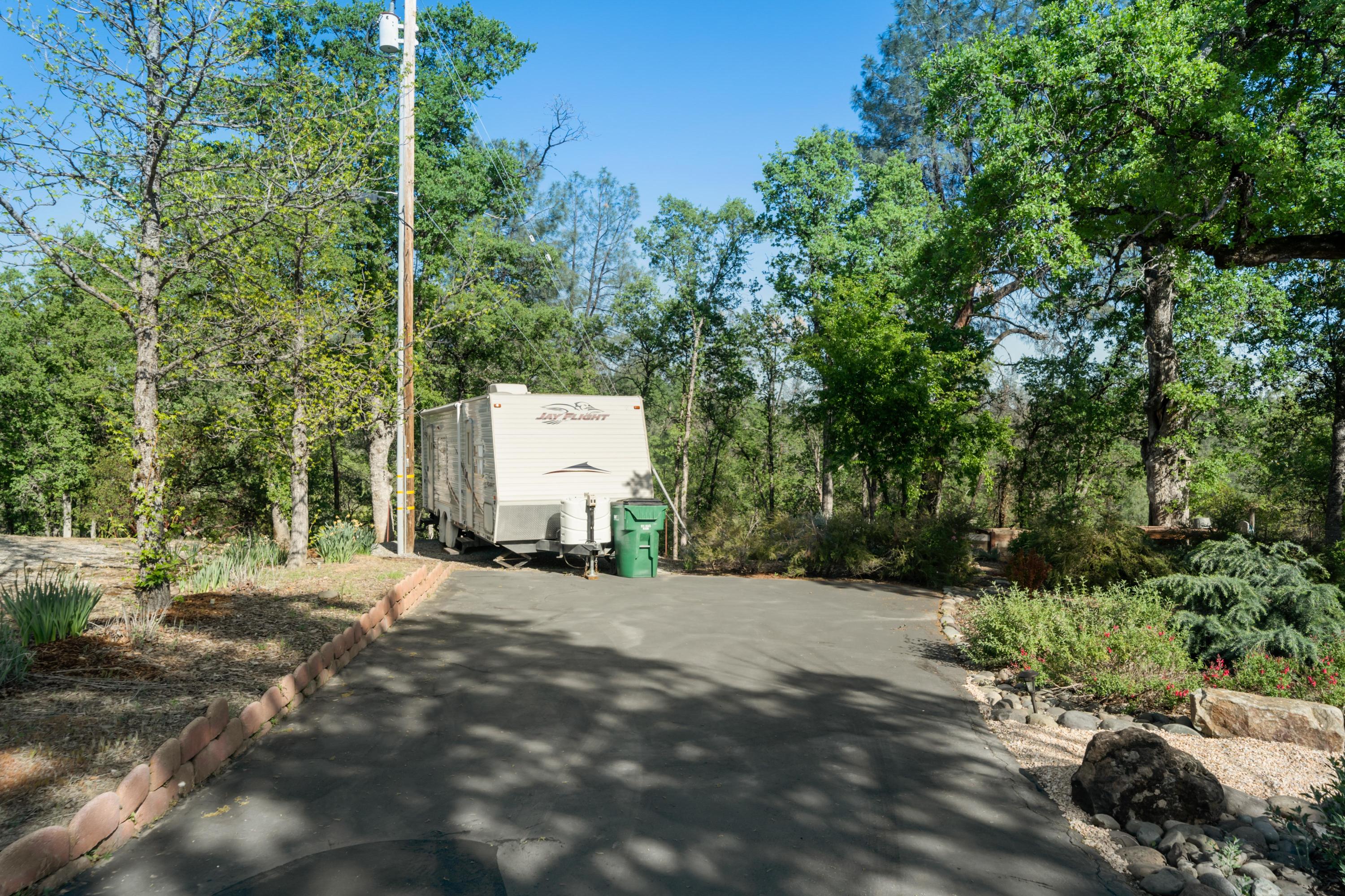 7777 Justice Mine Road Redding, CA 96001 - Photo 50 of 59 a view of a house with a outdoor space