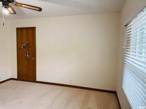 a view of bathroom and utility room