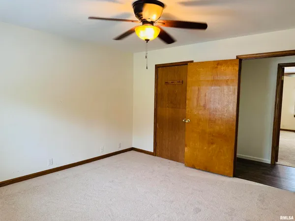 a view of a big room with carpet