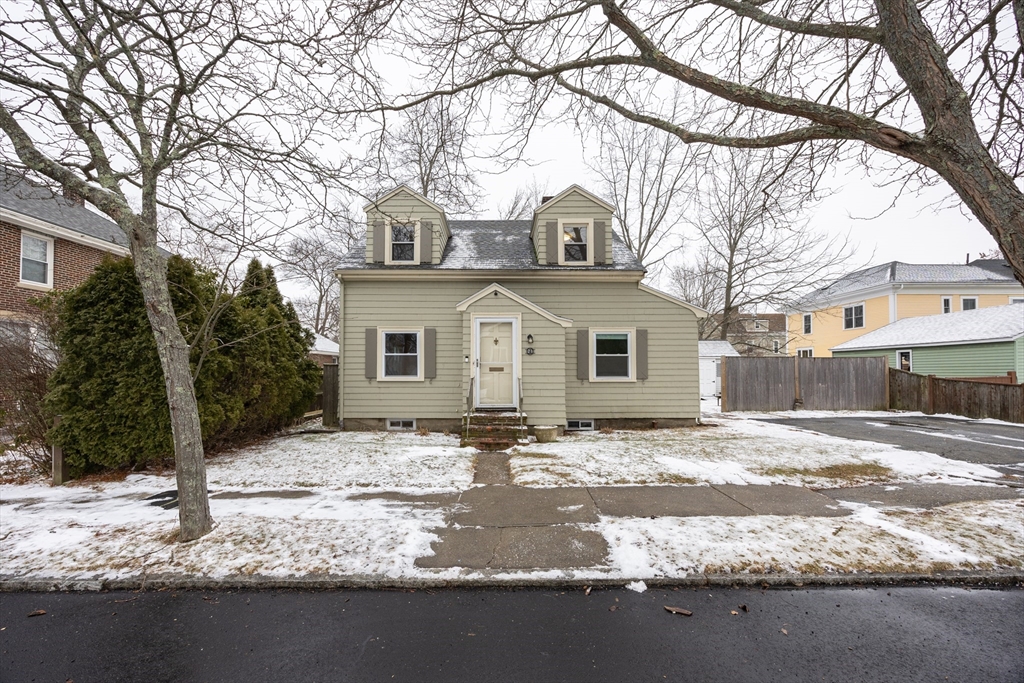 21 Manning Street Salem, MA 01970 - Photo 2 of 26 a view of a house with snow on the road
