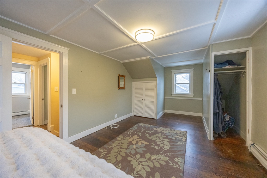 21 Manning Street Salem, MA 01970 - Photo 21 of 26 a view of livingroom with hardwood floor and hallway