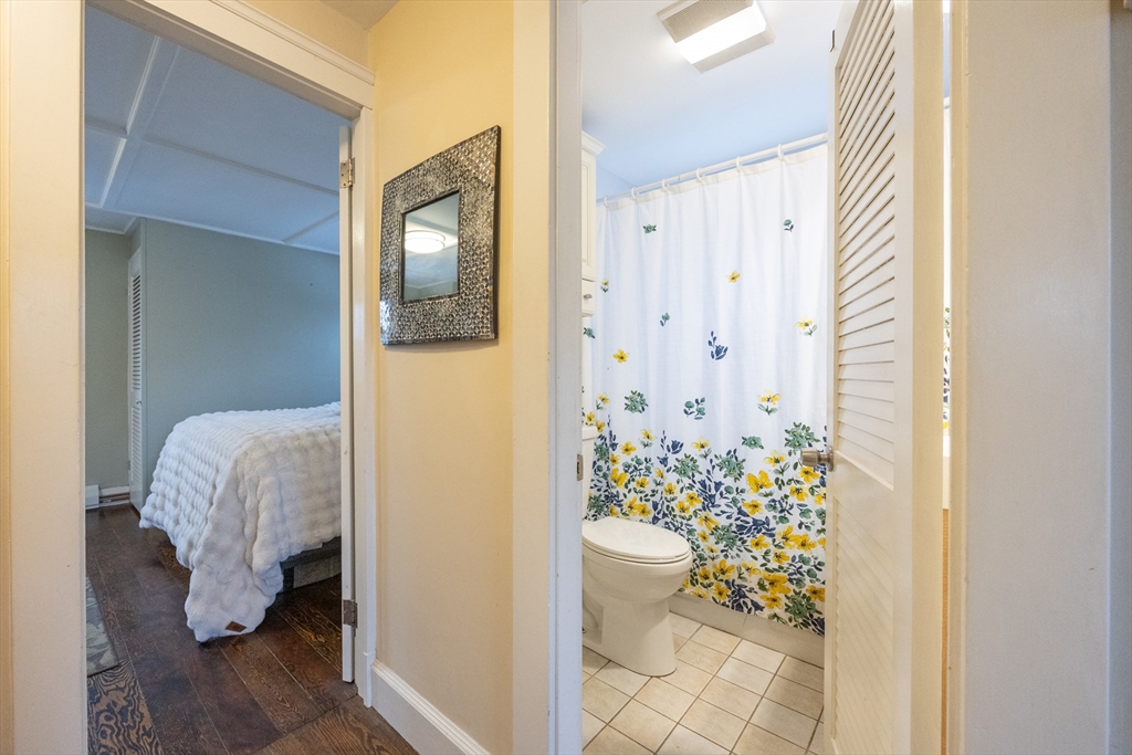 21 Manning Street Salem, MA 01970 - Photo 23 of 26 a bathroom with a toilet and shower