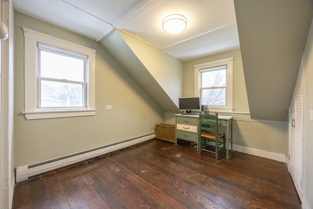 21 Manning Street Salem, MA 01970 - Photo 24 of 26 a living room with furniture and a window