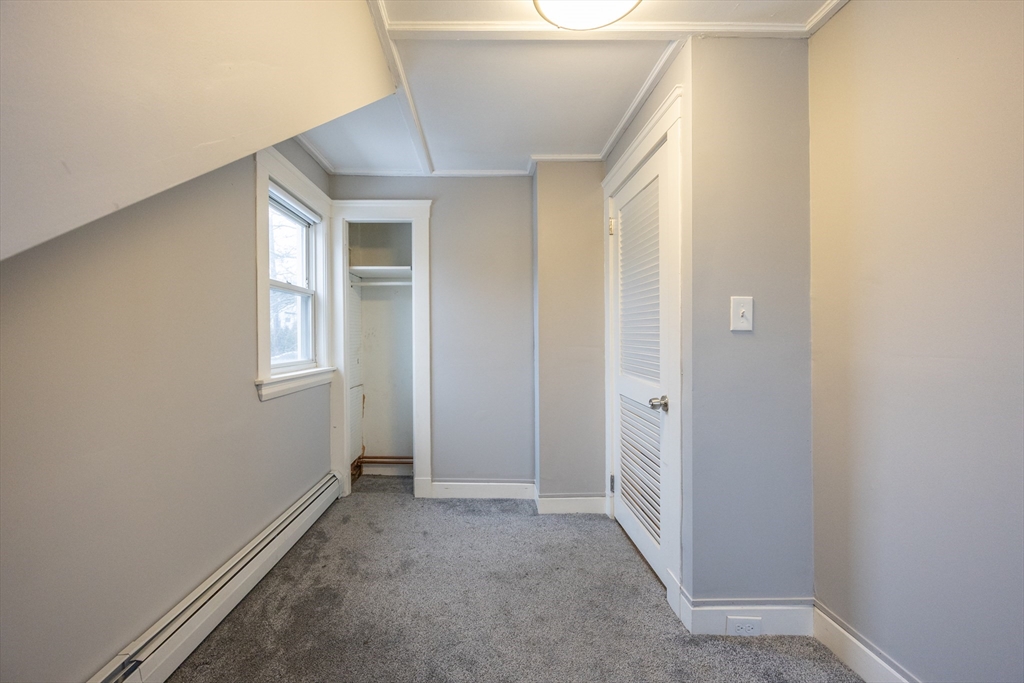 21 Manning Street Salem, MA 01970 - Photo 25 of 26 a view of a hallway with closet