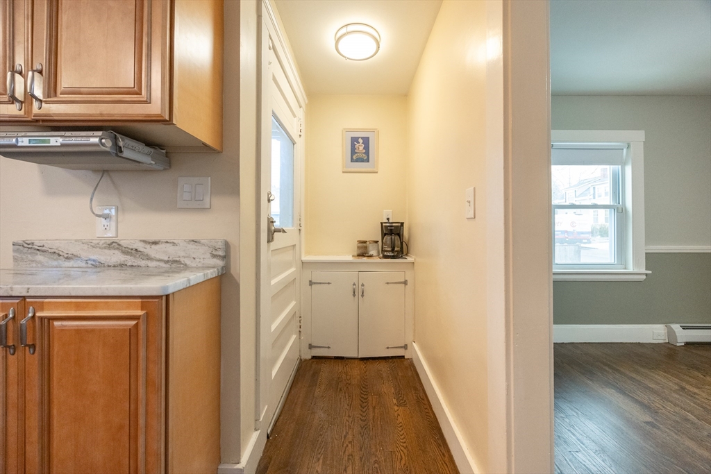 21 Manning Street Salem, MA 01970 - Photo 8 of 26 a bathroom with a sink and a mirror