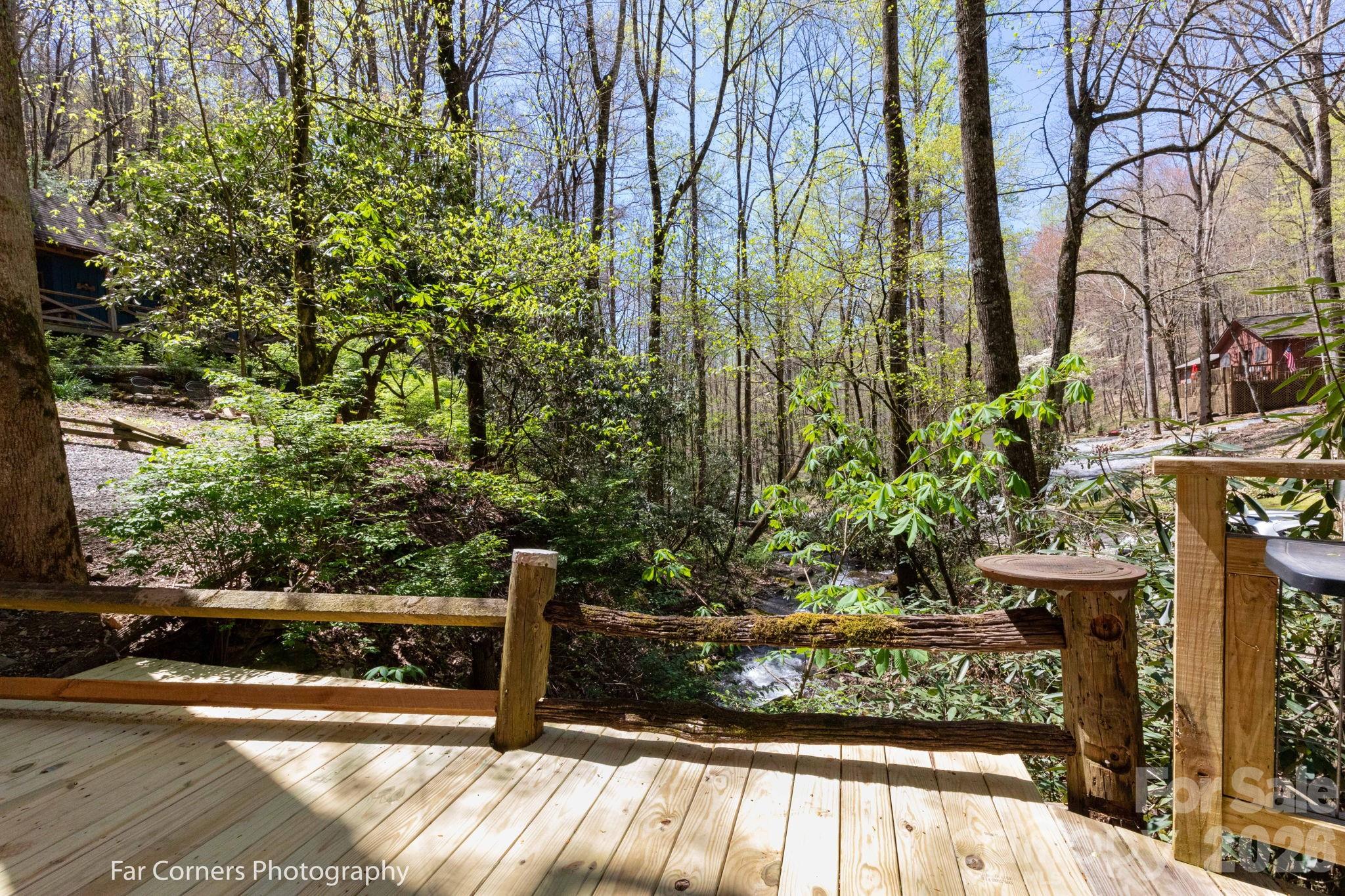 2670 Dicks Creek Road Whittier, NC 28789 - Photo 11 of 21 a view of a bench in patio
