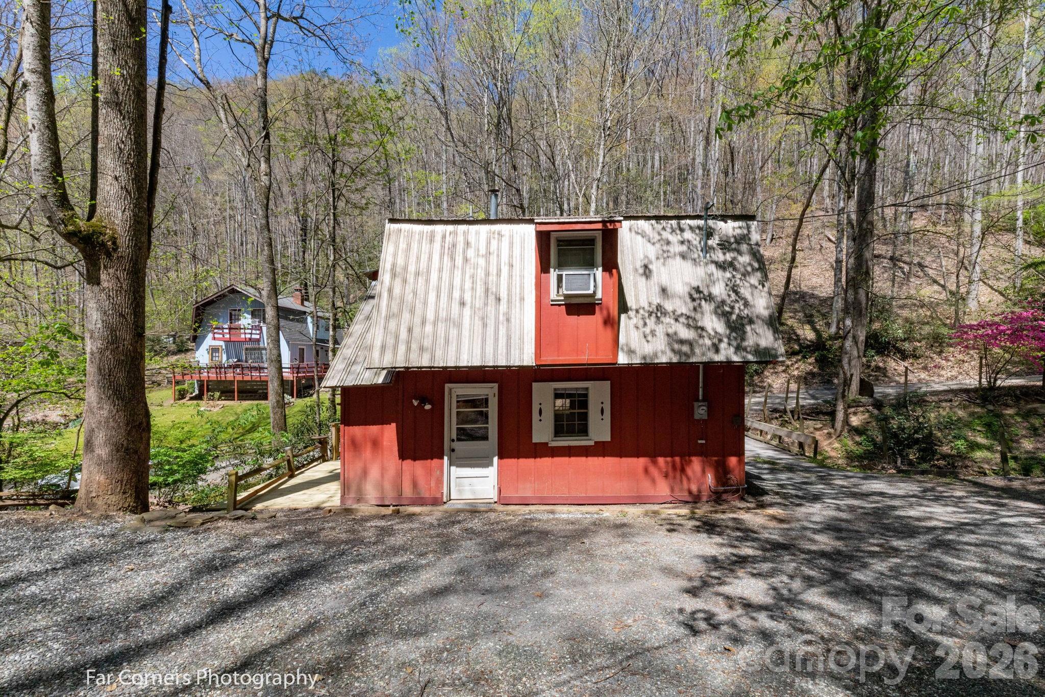 2670 Dicks Creek Road Whittier, NC 28789 - Photo 13 of 21 front view of a house with a yard