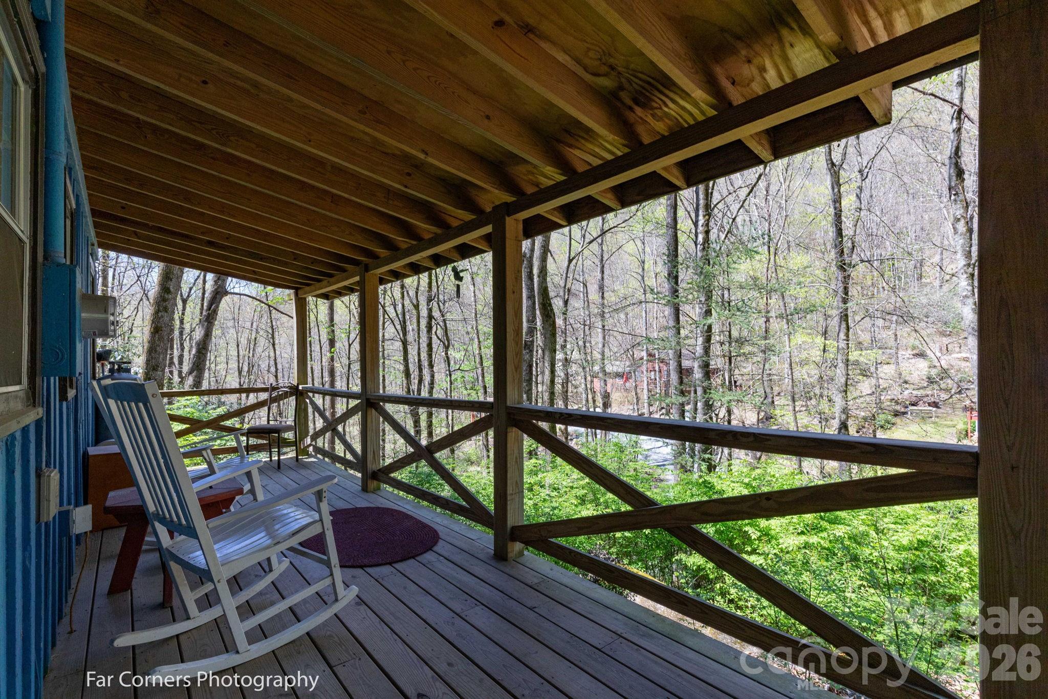 2670 Dicks Creek Road Whittier, NC 28789 - Photo 15 of 21 a view of a chairs and table in the balcony