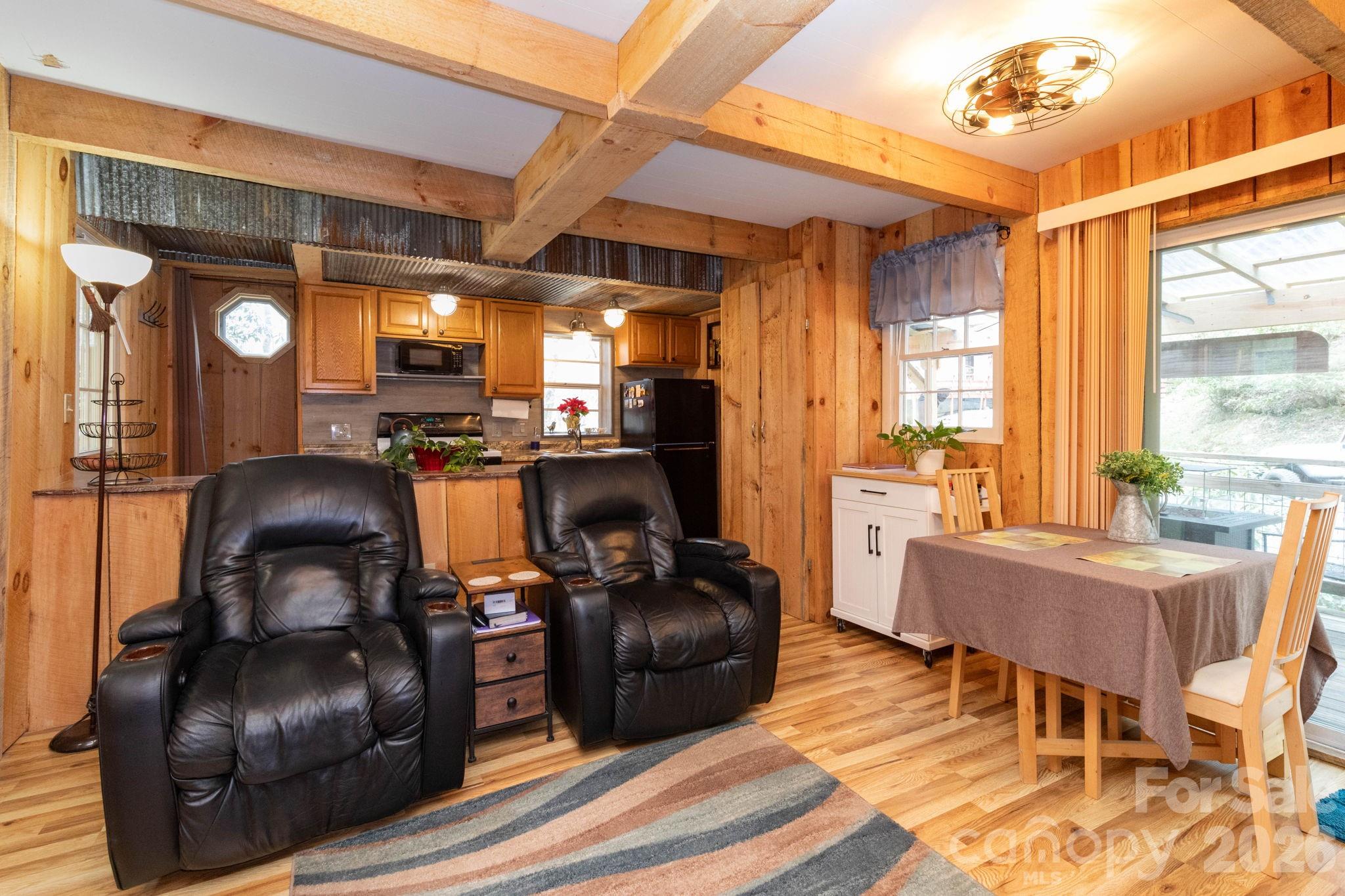 2670 Dicks Creek Road Whittier, NC 28789 - Photo 3 of 21 a living room with furniture and a large window