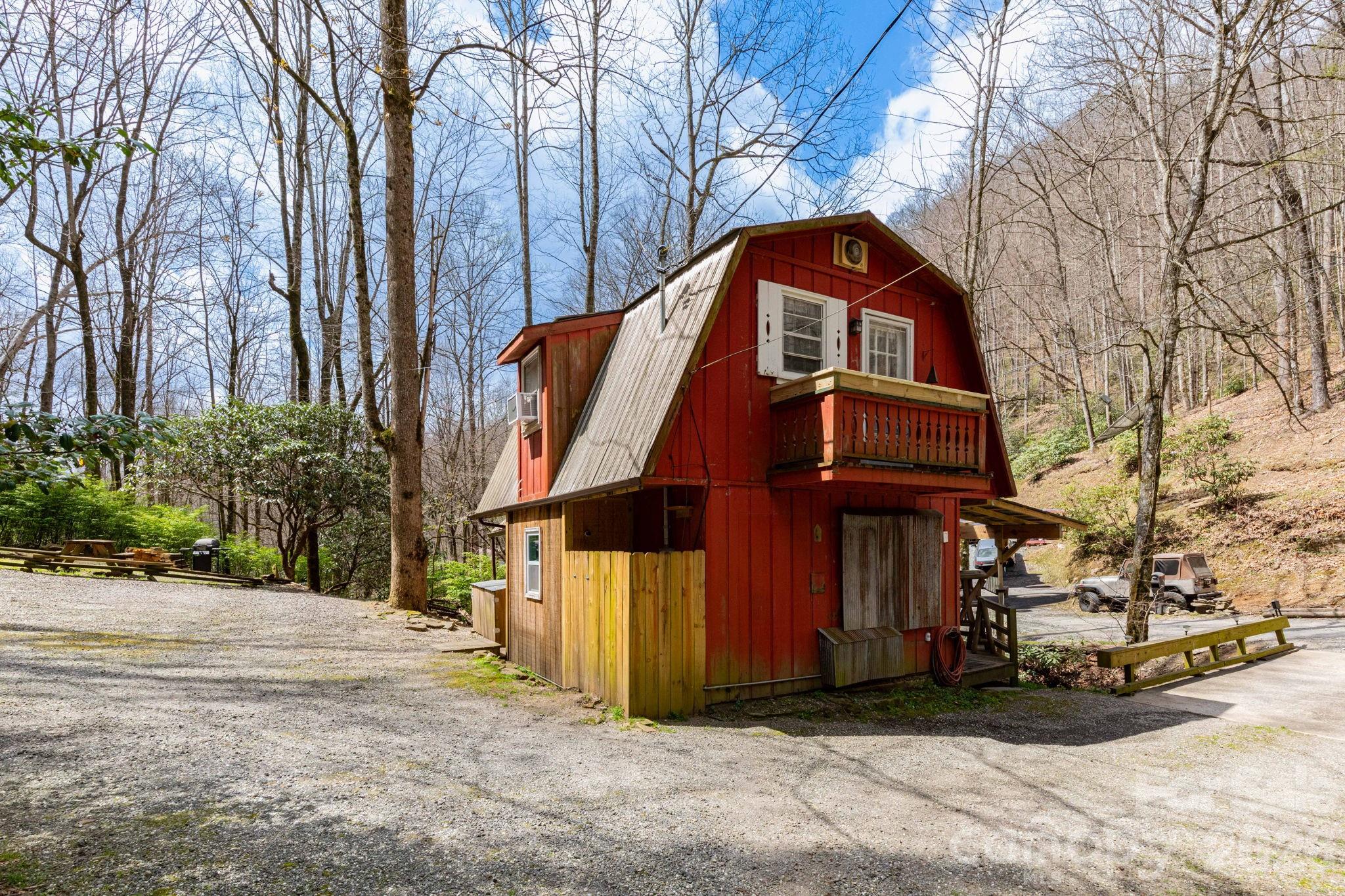 2670 Dicks Creek Road Whittier, NC 28789 - Photo 10 of 21 a front view of a house with a yard