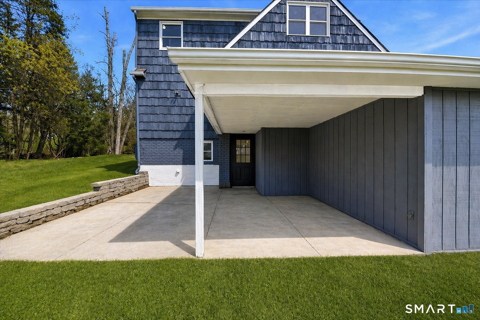 12 Darien Road New Fairfield, CT 06812 - Photo 26 of 31 Walk-out access from basement