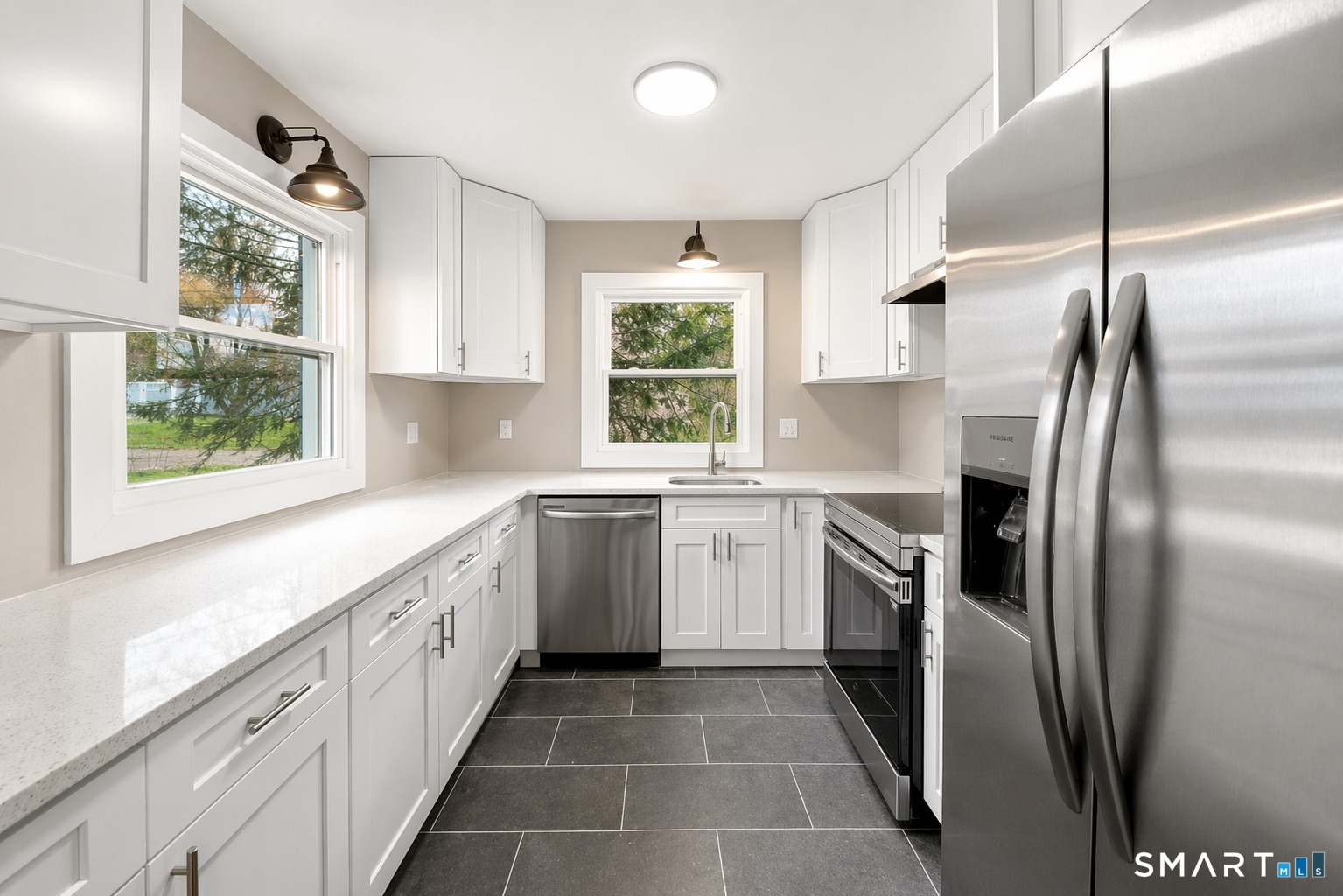 12 Darien Road New Fairfield, CT 06812 - Photo 5 of 31 Main floor through dining area/entry.