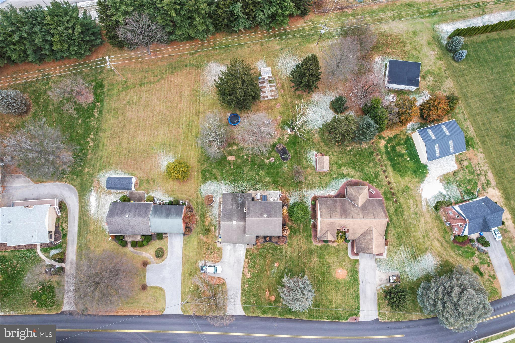 193 Dew Drop Road York, PA 17402 - Photo 7 of 59 an aerial view of residential houses with outdoor space and swimming pool
