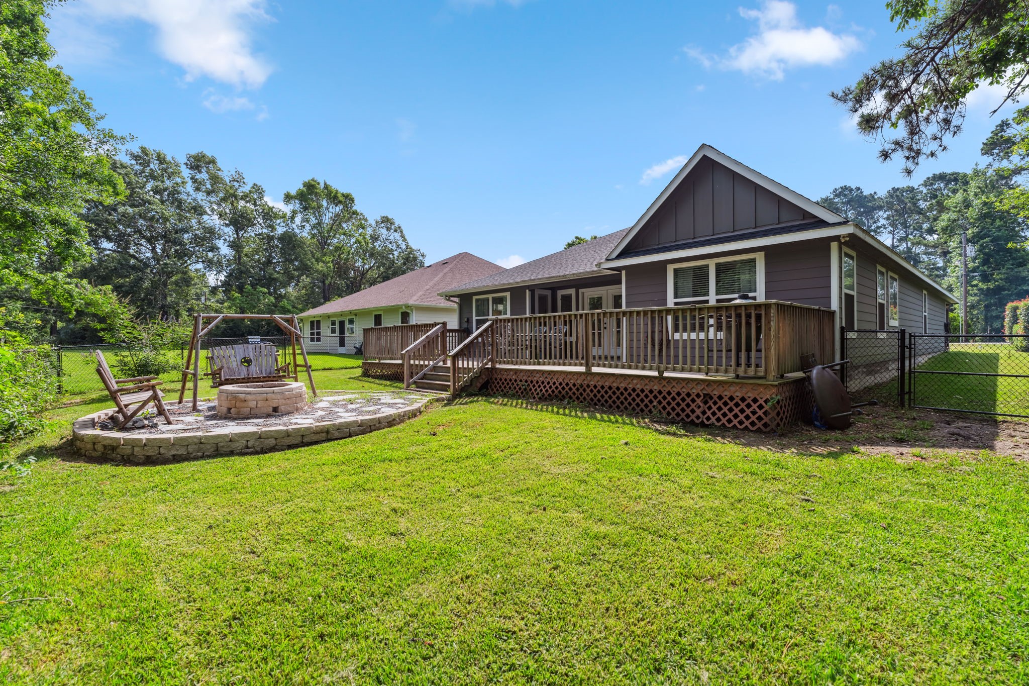 129 Bridgepoint Onalaska, TX 77360 - Photo 24 of 35 a view of a house with a yard and deck