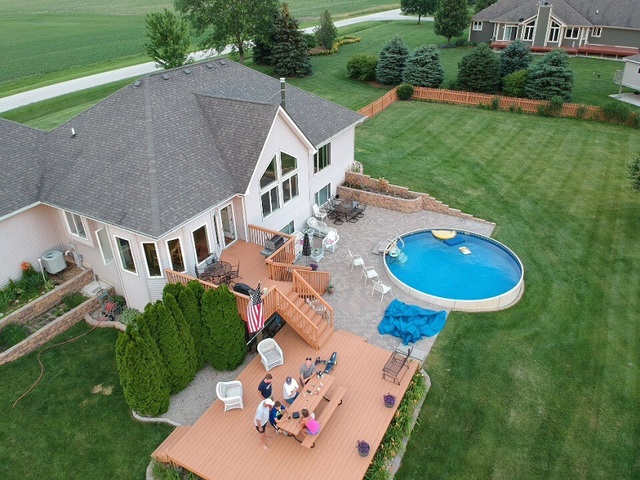 30813 Lincoln Road Genoa, IL 60135 - Photo 2 of 20 a aerial view of a house with a yard and trees