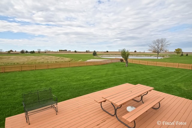 30813 Lincoln Road Genoa, IL 60135 - Photo 19 of 20 a view of a lake and a yard