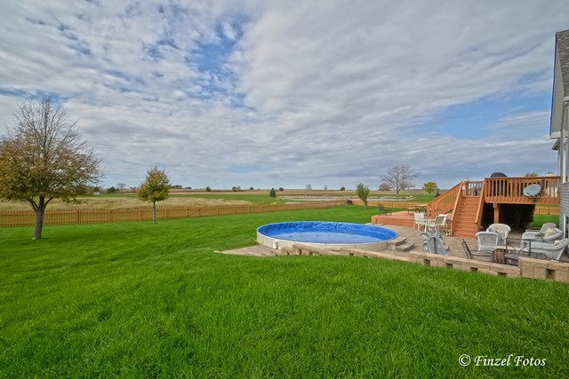 30813 Lincoln Road Genoa, IL 60135 - Photo 20 of 20 a view of yard with swimming pool and seating