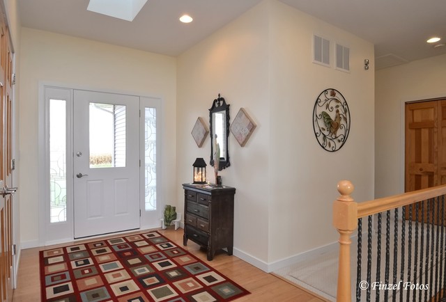 30813 Lincoln Road Genoa, IL 60135 - Photo 4 of 20 a view of a hallway to a livingroom with furniture
