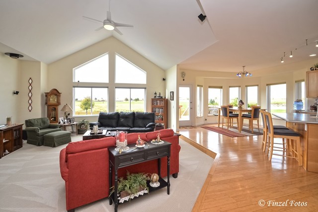 30813 Lincoln Road Genoa, IL 60135 - Photo 5 of 20 a living room with furniture and a large window