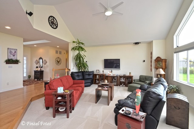 30813 Lincoln Road Genoa, IL 60135 - Photo 6 of 20 a living room with furniture and a flat screen tv