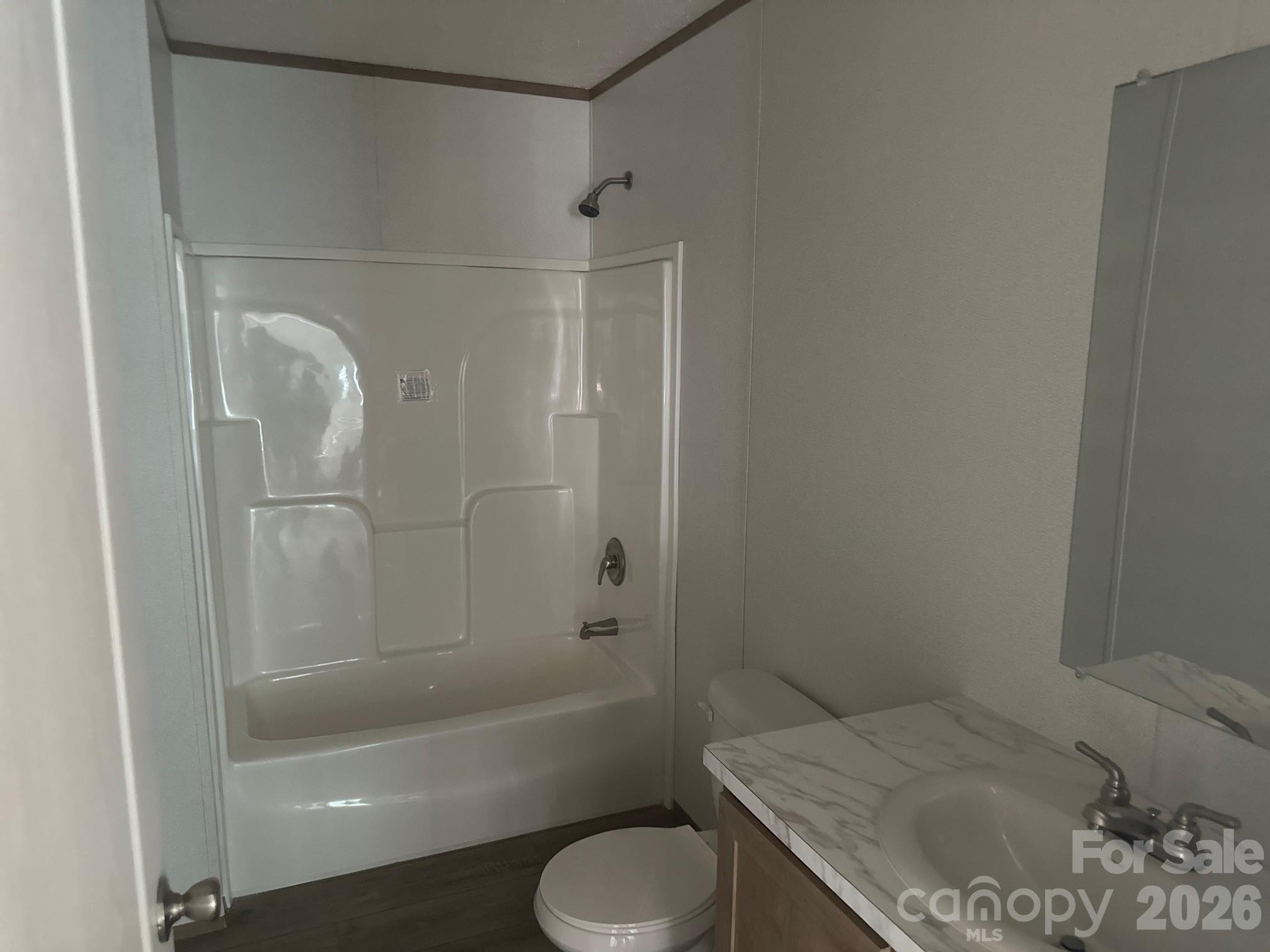 178 Clear Springs Road Mooresville, NC 28115 - Photo 11 of 13 a bathroom with a sink toilet and shower