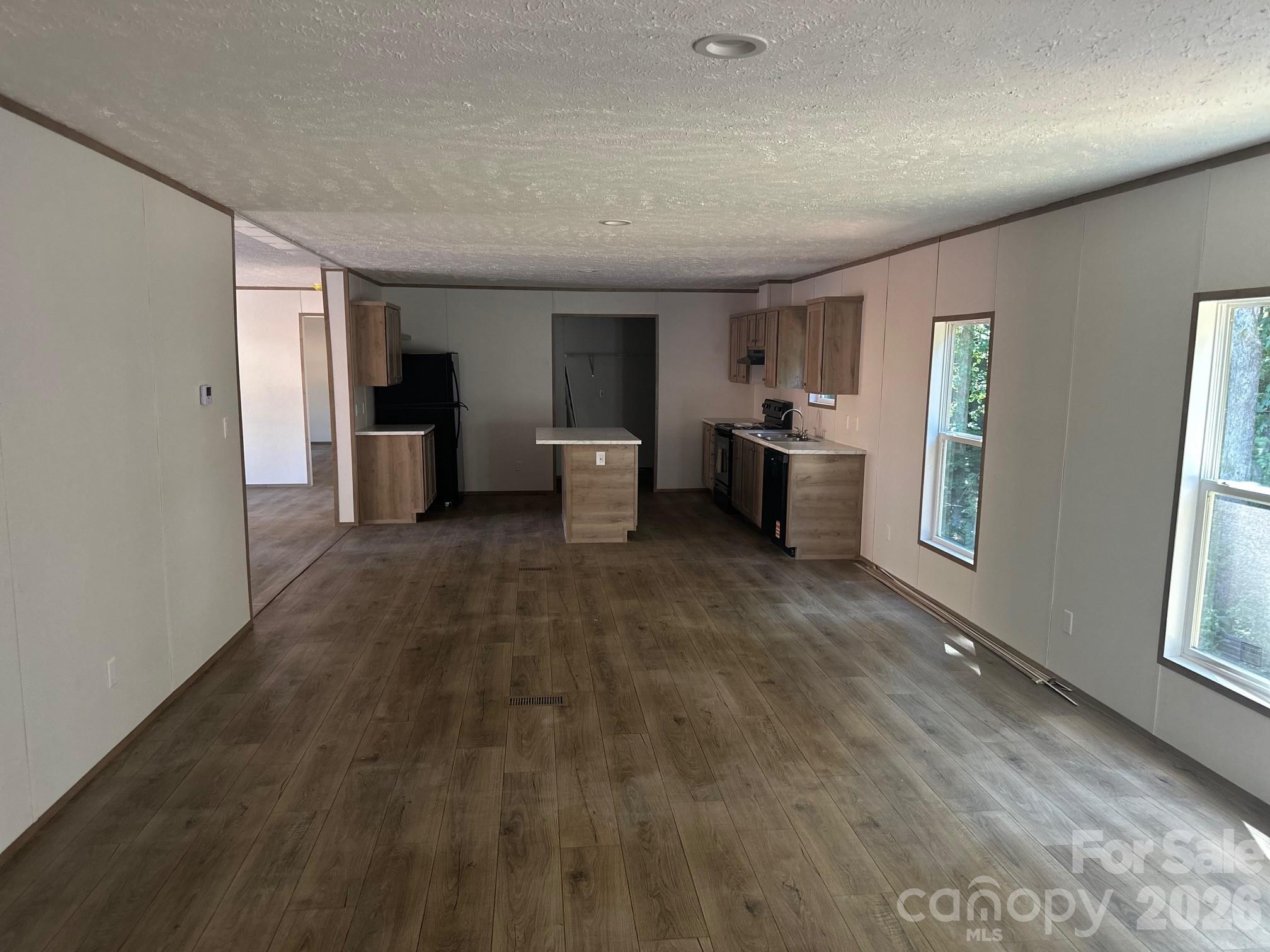 178 Clear Springs Road Mooresville, NC 28115 - Photo 4 of 13 a living room with furniture and large window