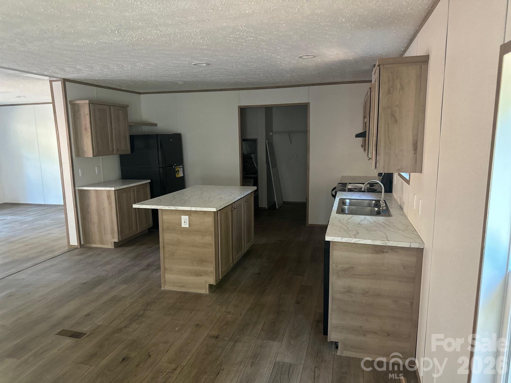 178 Clear Springs Road Mooresville, NC 28115 - Photo 5 of 13 a room with storage and utility