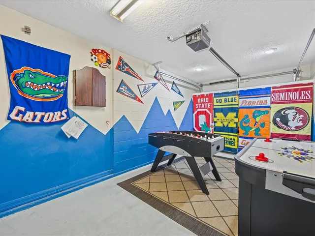 a room with musical instruments and air hockey table