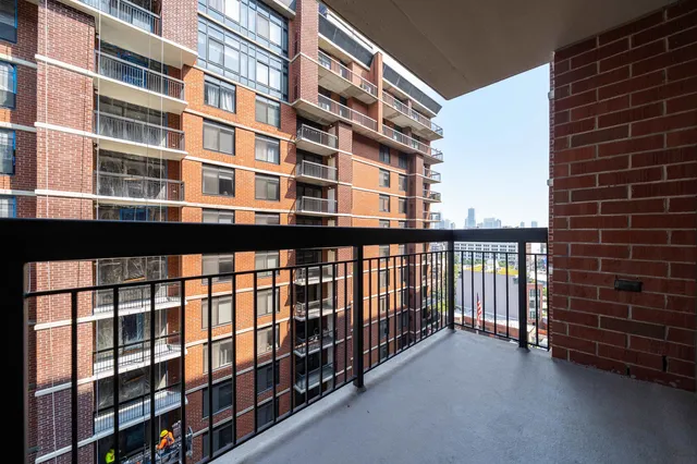 a view of a building from a balcony