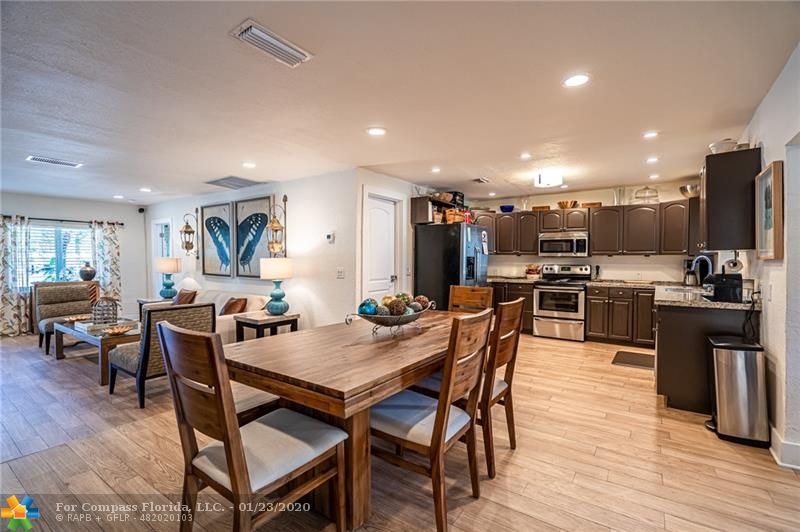 Welcome Home! Open concept floor plan living area , dining area, and kitchen.