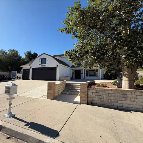 a view of a terrace with chairs