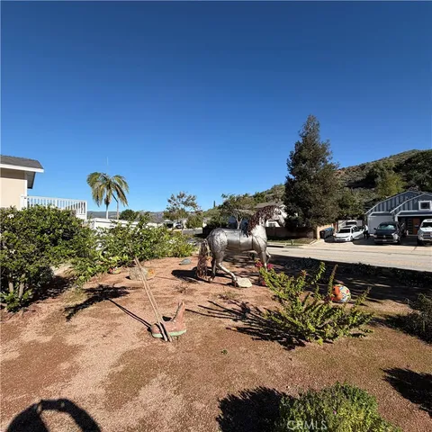 a room with furniture and wooden floor