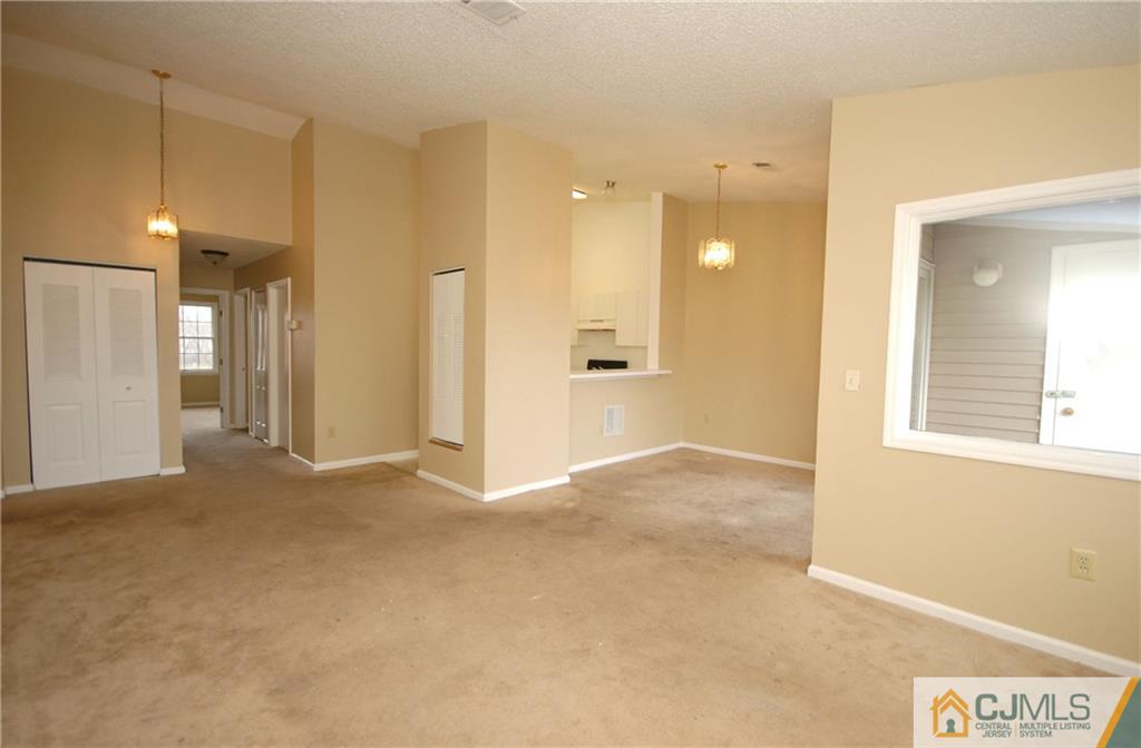 1037 Edpas Road, Unit 1037 New Brunswick, NJ 08901 - Photo 4 of 15 a view of an empty room with a bathroom