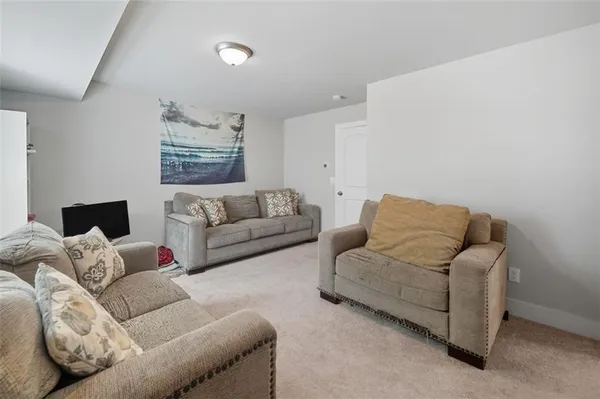 a living room with furniture and a couch