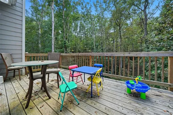 a view of chairs on wooden deck