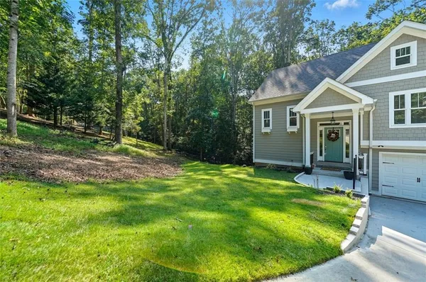 a backyard of a house with seating space