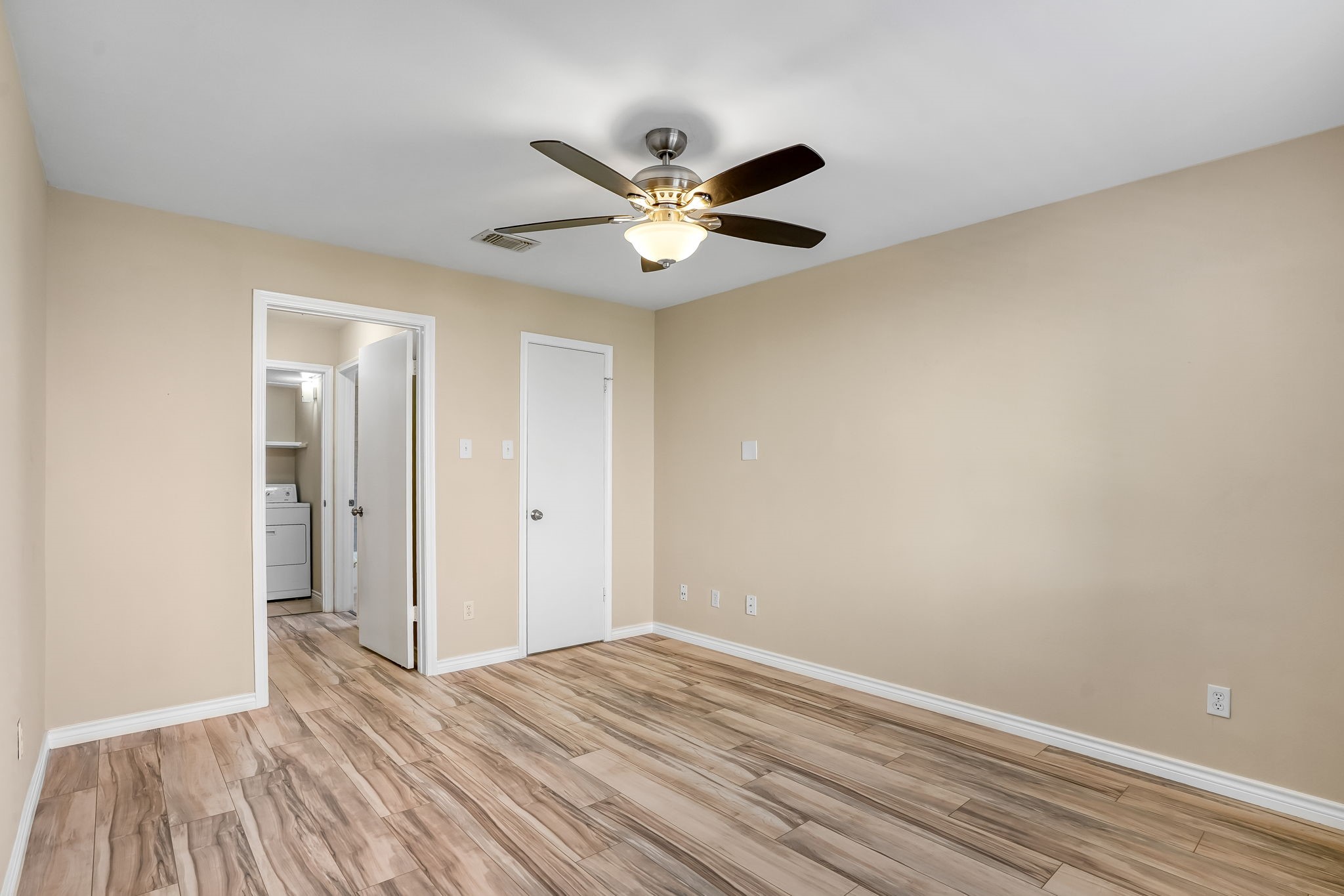 3500 Tangle Brush Drive, Unit 150 Spring, TX 77381 - Photo 12 of 23 The owner's suite is connected to the bathroom and laundry room optimizing functionality.
