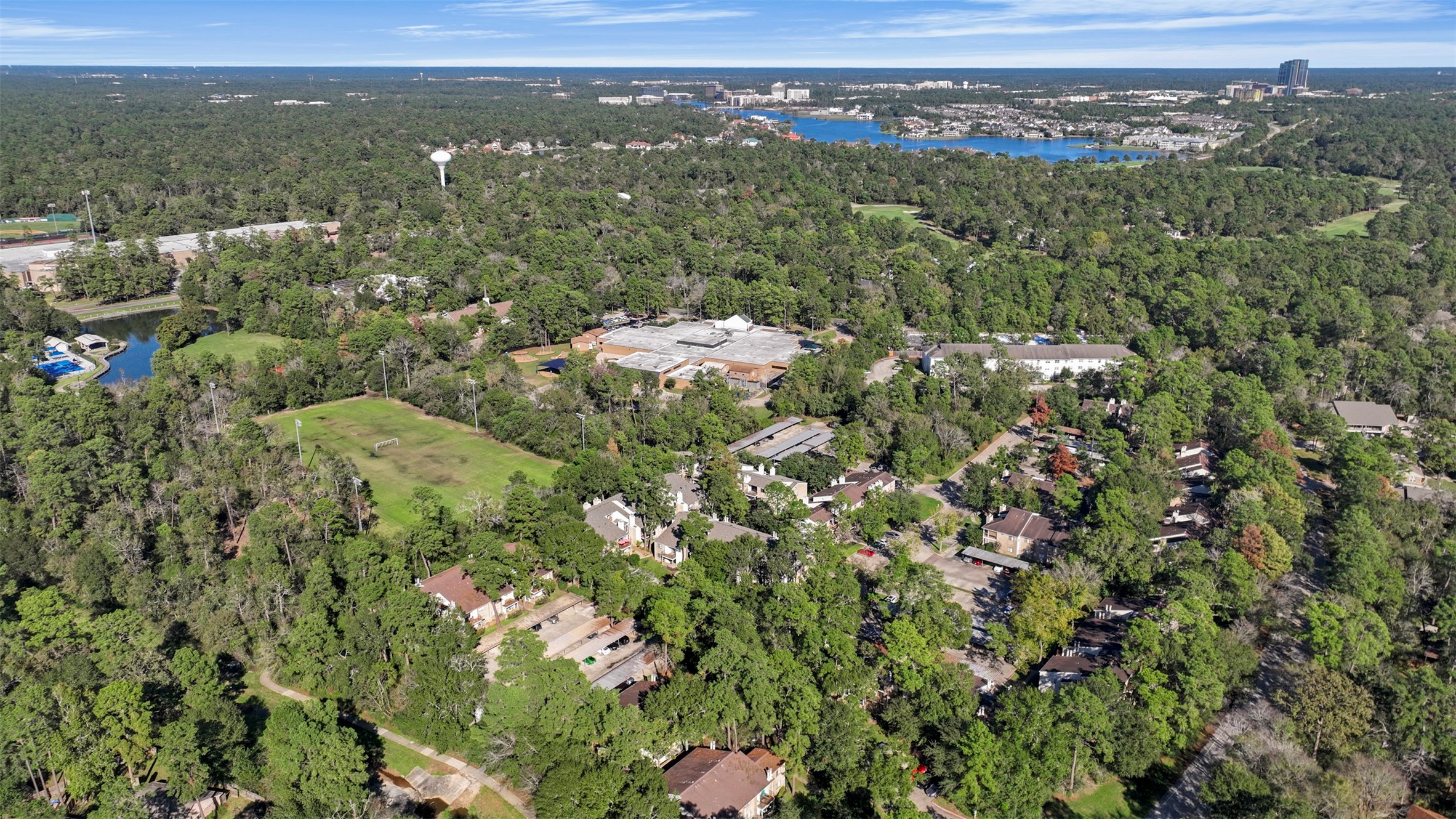 3500 Tangle Brush Drive, Unit 150 Spring, TX 77381 - Photo 20 of 23 The Creekwood Village Condominiums back directly to Creekwood Park with access to the pool, tennis & pickleball courts, basketball, skate park, duck pond, and soccer field.