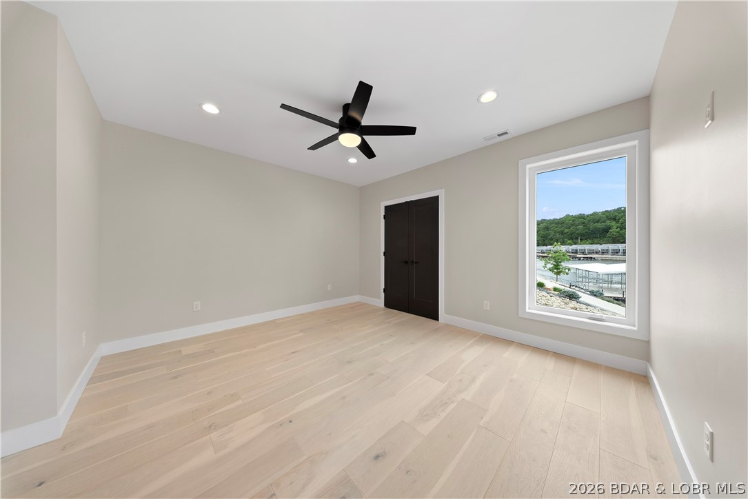 439 Red Bud Road Lake Ozark, MO 65049 - Photo 66 of 98 Comfortable secondary bedroom with oversized windo