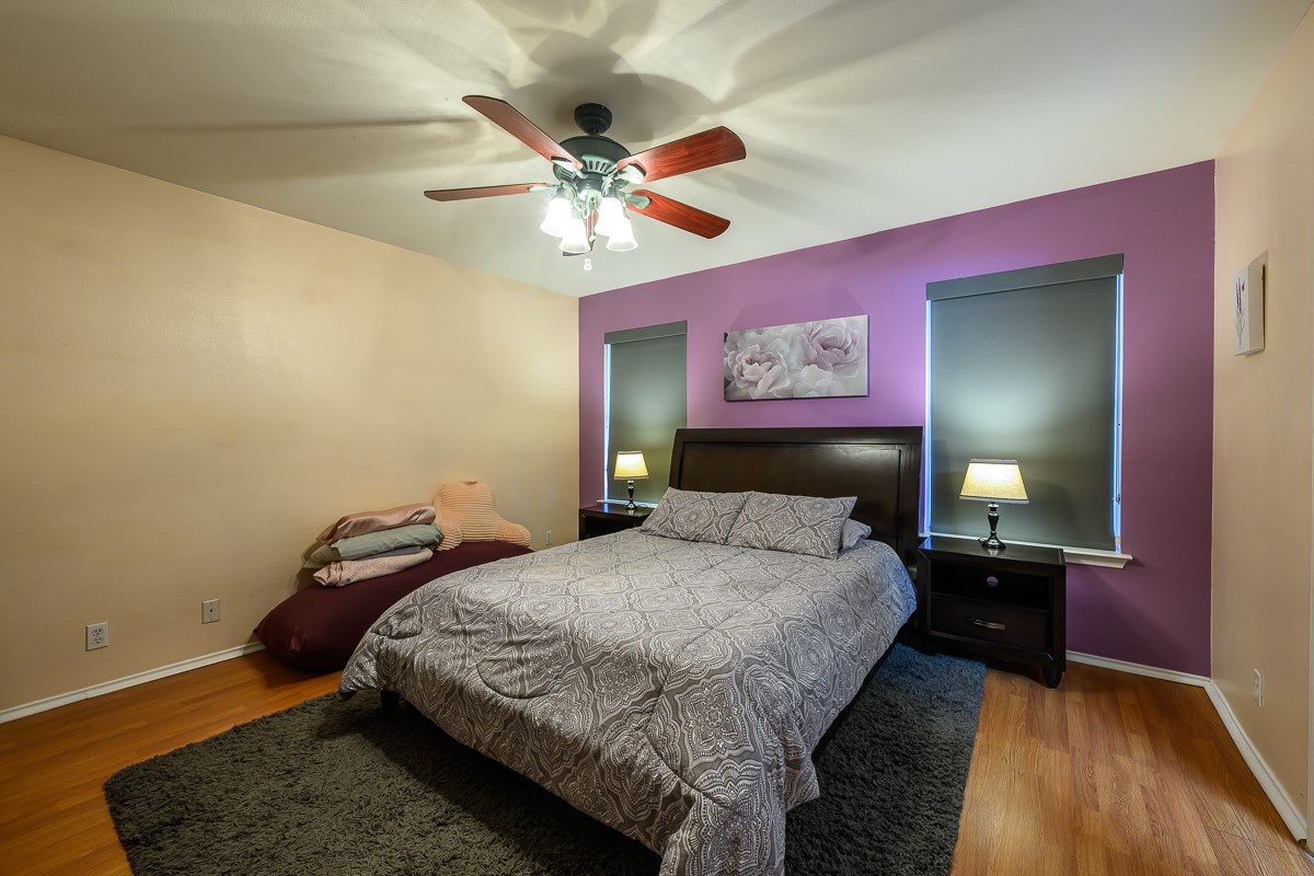 8920 Frock Court Austin, TX 78748 - Photo 13 of 22 a bedroom with a bed and a mirror