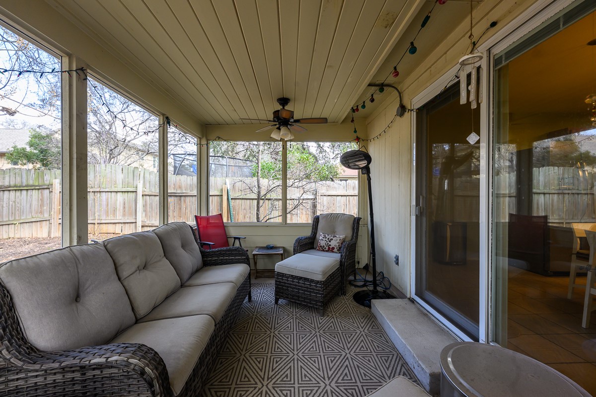 8920 Frock Court Austin, TX 78748 - Photo 18 of 22 a living room with furniture and a large window