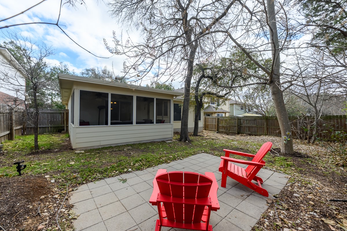 8920 Frock Court Austin, TX 78748 - Photo 22 of 22 a view of backyard with outdoor seating and trees