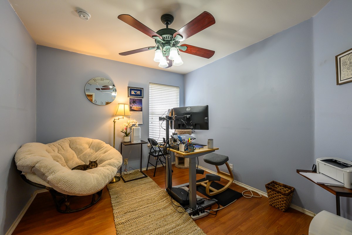 8920 Frock Court Austin, TX 78748 - Photo 10 of 22 a workspace with furniture and a ceiling fan