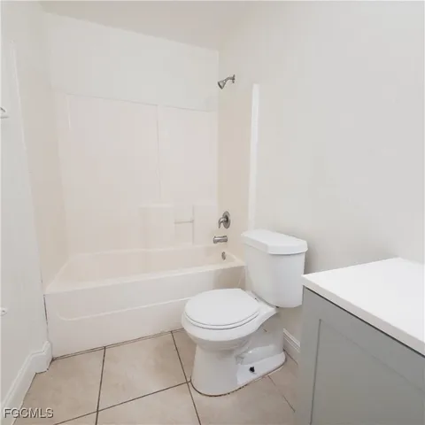 a kitchen with stainless steel appliances granite countertop a sink and a stove