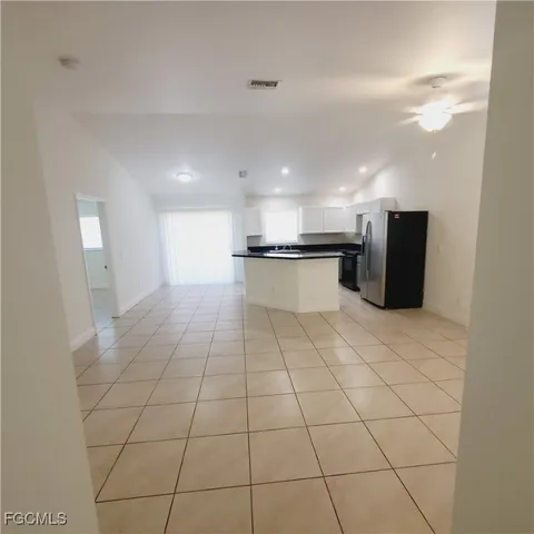 a kitchen with stainless steel appliances a sink and a counter top space