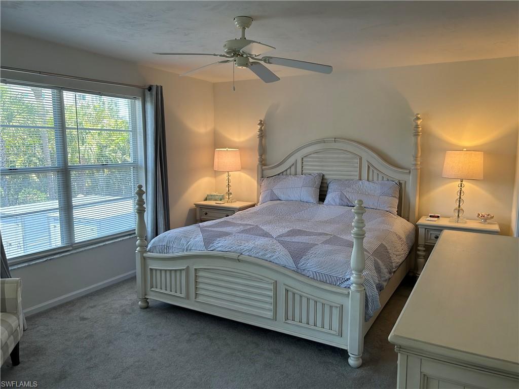 509 Roma Court, Unit 201 Naples, FL 34110 - Photo 11 of 17 Primary Bedroom King Bed