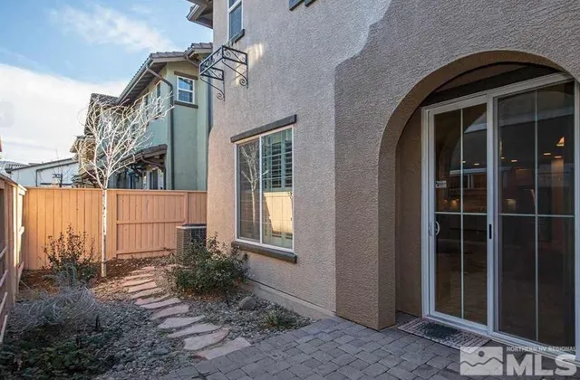 a view of a house with a door and porch