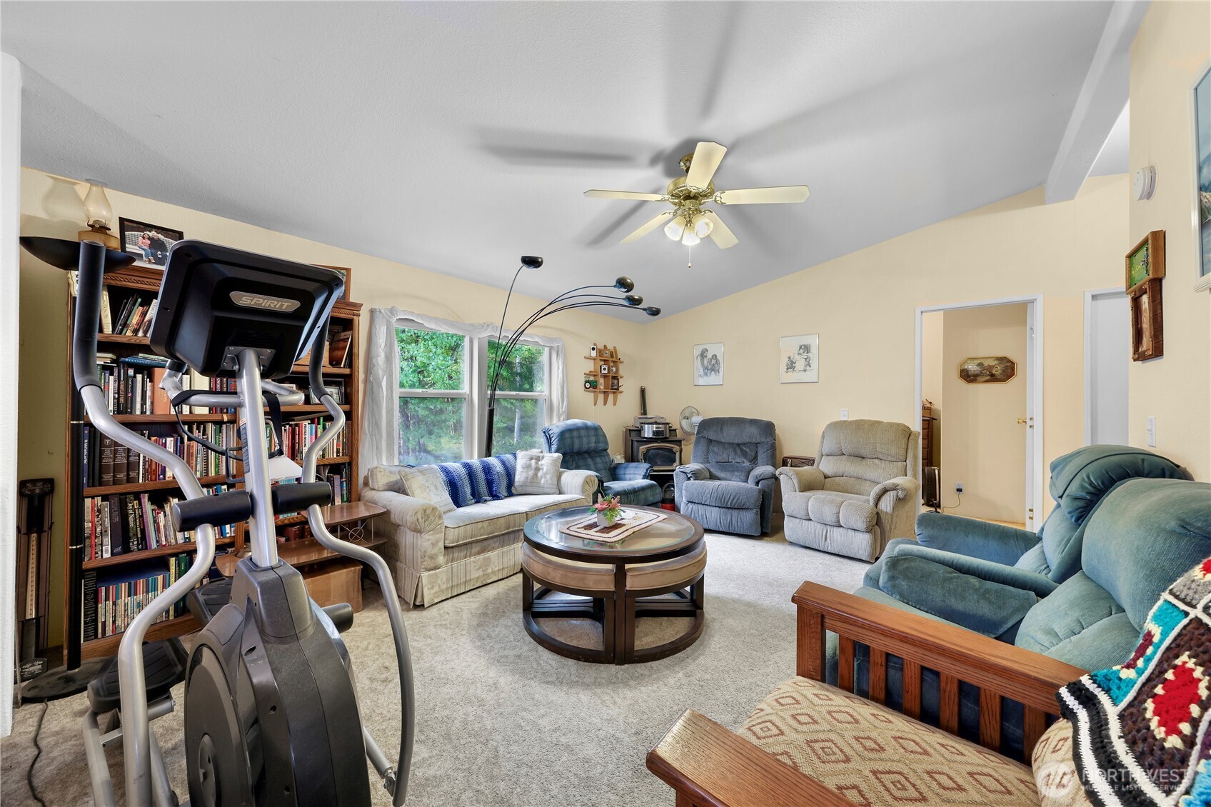 7928 Portal Way Custer, WA 98240 - Photo 13 of 39 a living room with furniture a ceiling fan and a rug