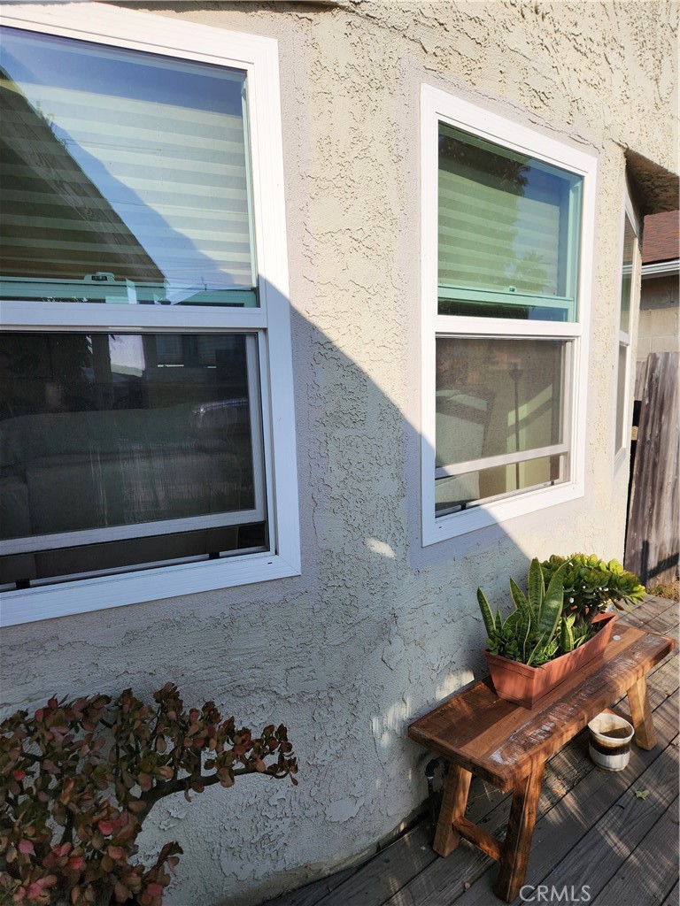 5591 Nelson Street Cypress, CA 90630 - Photo 5 of 5 a view of a entryway door of the house with outdoor seating