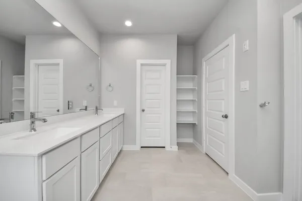 a view of an empty walk in closet